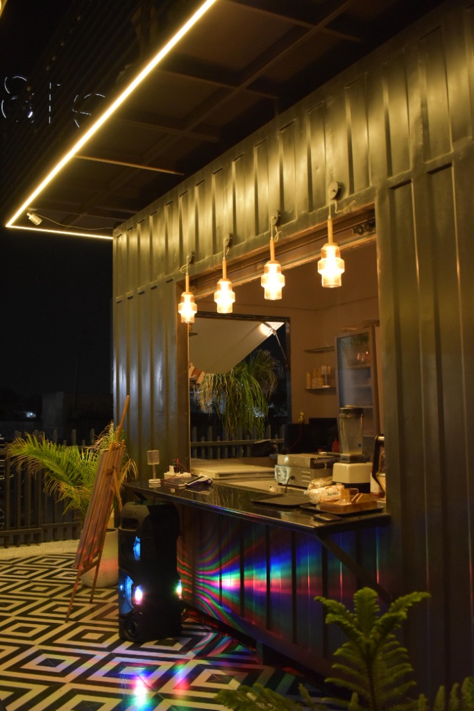 One18 Cafe chef cooking with fire