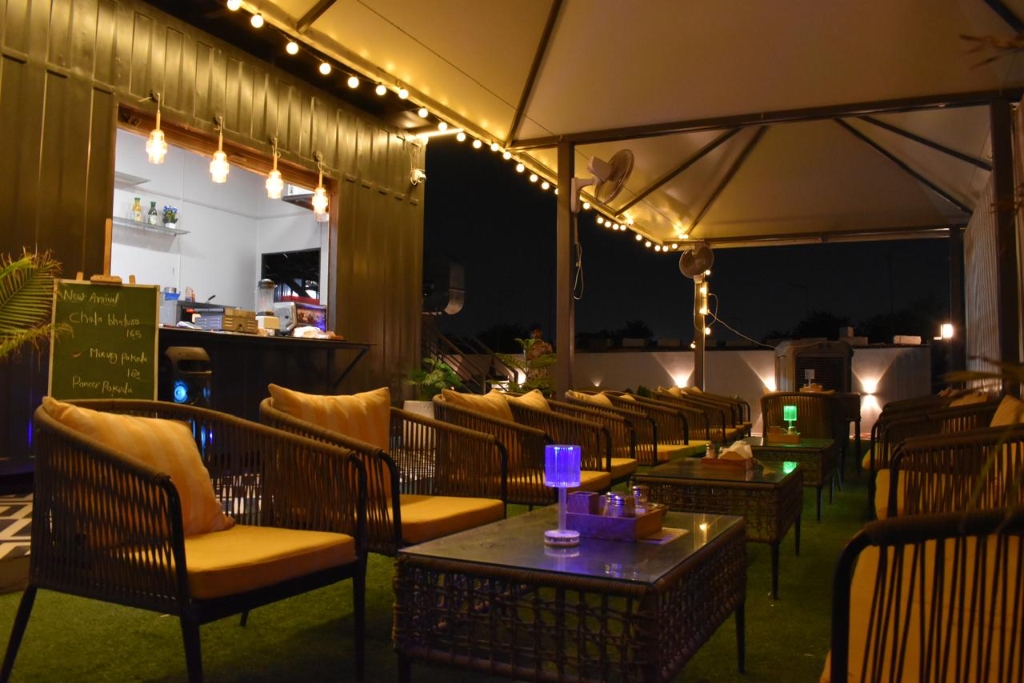 One18 bar with baristas crafting drinks