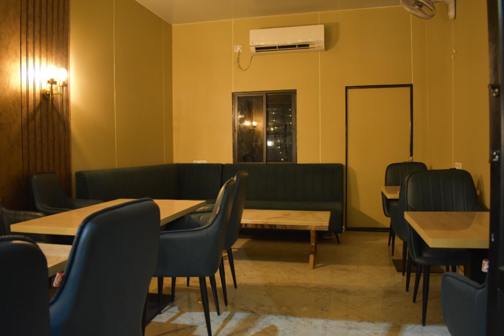 One18 Cafe cozy indoor seating with plush sofas and warm lighting